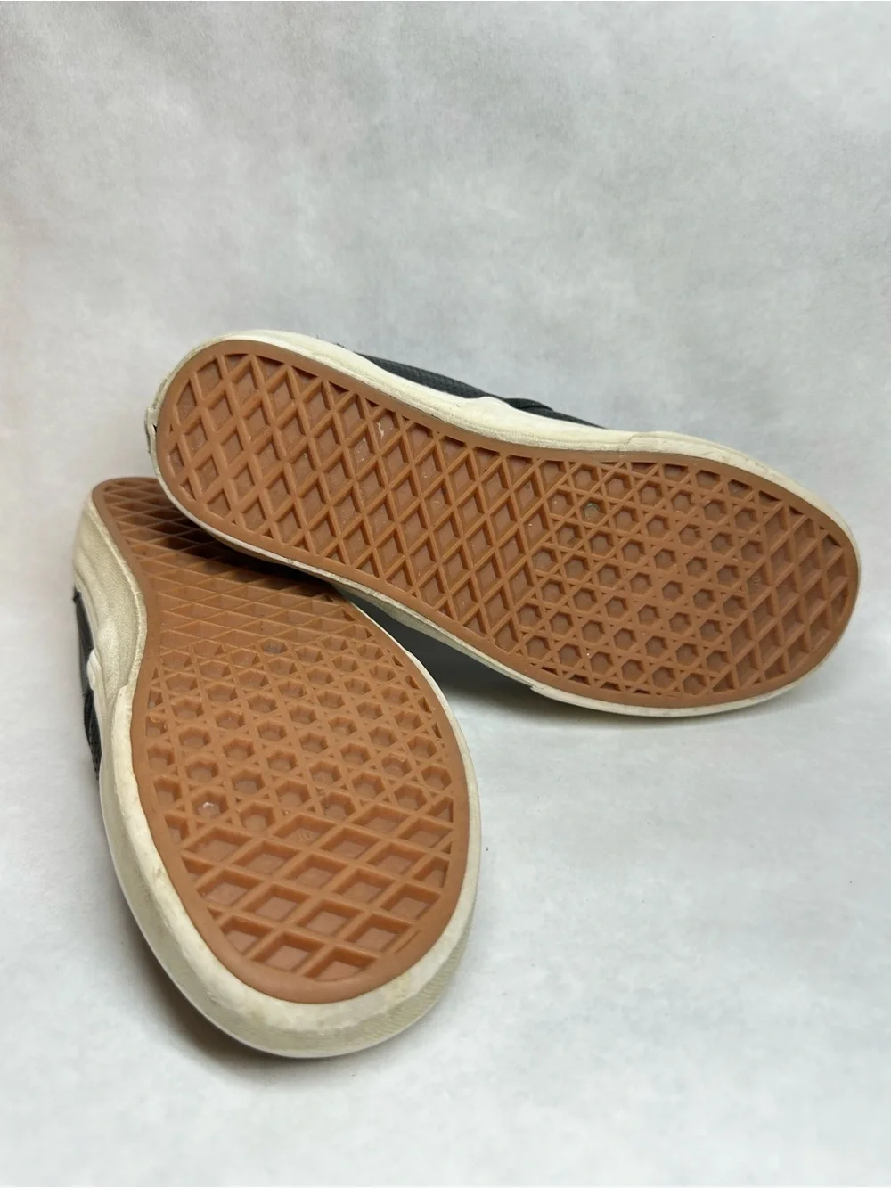 Vans Black Perforated Leather Slip-On Sneakers